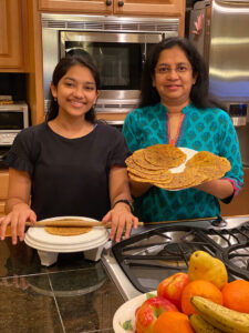 Anika and Ami cooking paneer paratha